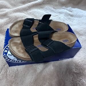 Birkenstock Black Sandals with Brown Footbed